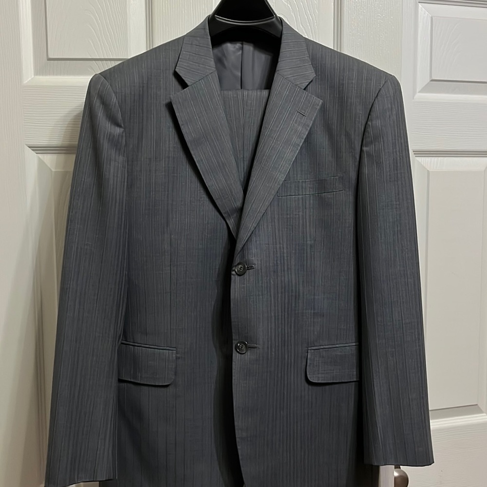 ailored grey two-piece men suit. Jacket size 40R/ Pant size 34 waist